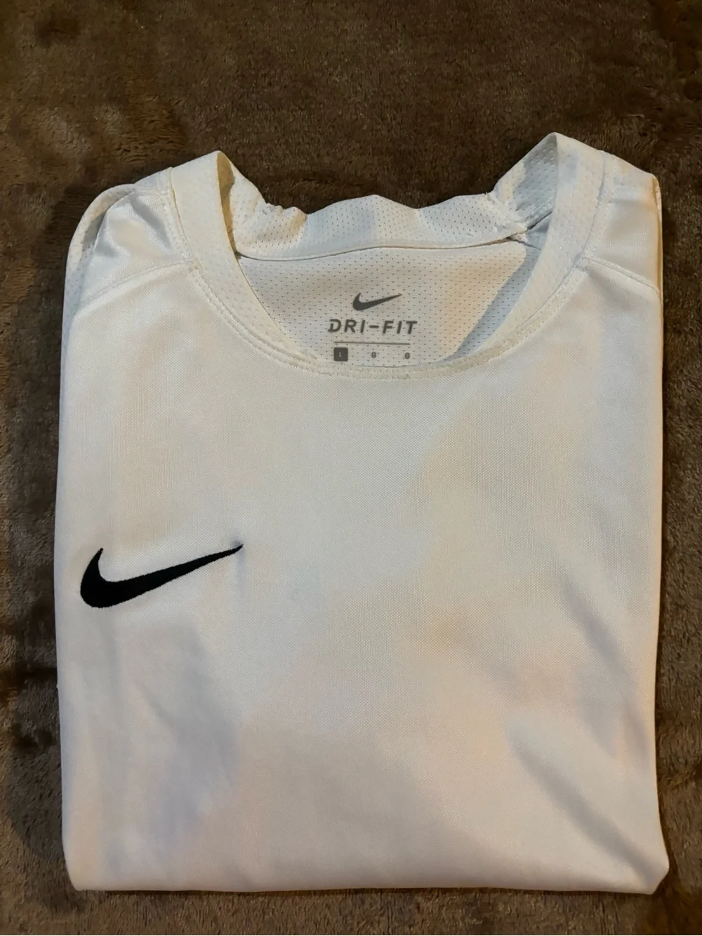Nike White Short-Sleeve Dri-FIT Tee with Black Swoosh